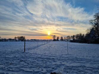 Bild mit Sonnenuntergang, winterlandschaft
