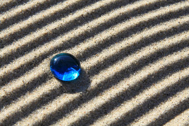 Blaues Glas und Sand 05